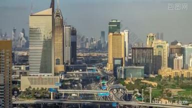迪拜码头摩天大楼和互联网城市塔的空中景观在谢赫 · 扎耶德路上飞驰而过.